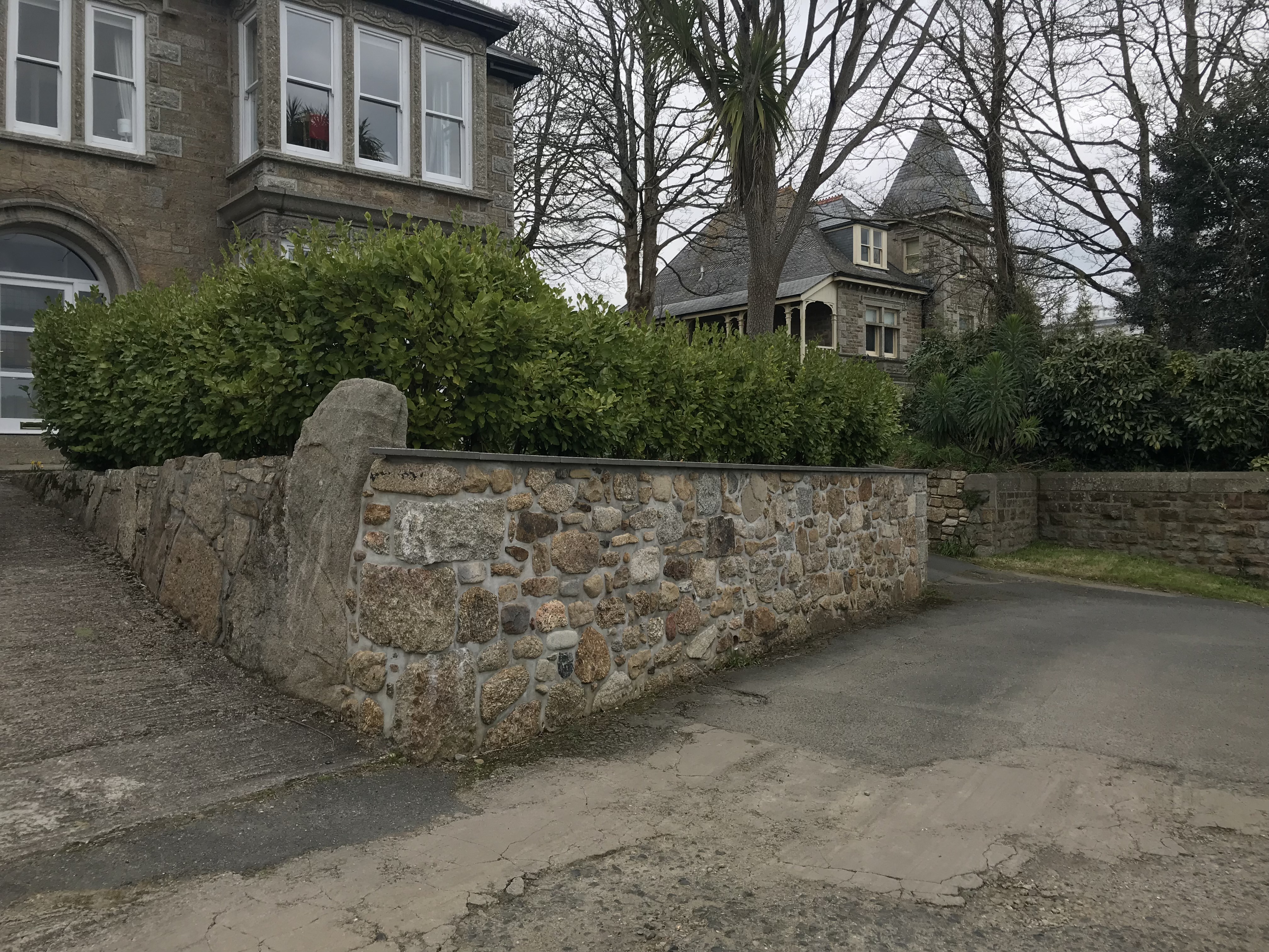 Mixed granite garden wall.