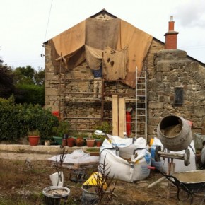 Covering the work with wet Hessian.  This stops the sun and wind drying the work and rain washing it out.