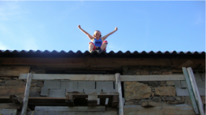 Bindle rejoicing at the roof finnaly being put on