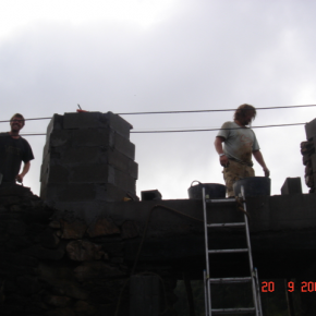 Building above the reinforced section. 
 We built the reveals in block and faced off in stone.