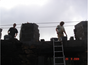 Building above the reinforced section. 
 We built the reveals in block and faced off in stone.