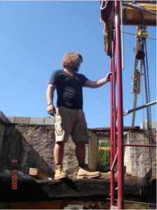 This was the most heath Robinson part of the build. We fashioned big Bertha (the scaffolding poles bolted together) to take the lifting gear. Then lowered the ancient roof truss down onto some preformed pillars to form a floor joist.