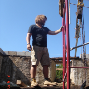 This was the most heath Robinson part of the build. We fashioned big Bertha (the scaffolding poles bolted together) to take the lifting gear. Then lowered the ancient roof truss down onto some preformed pillars to form a floor joist.