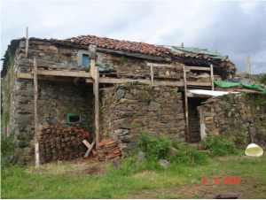 A nice shot of the building prior to the removal of the original decrepit roof.