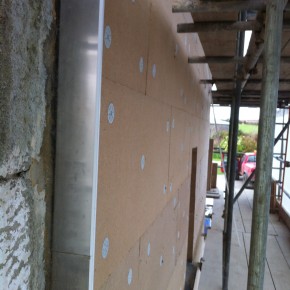 Here you can see the boards fixed to the lime rendered wall.