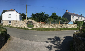 Specialist stone work Cornwall, artisan granite work, moon door, Arched door with granite