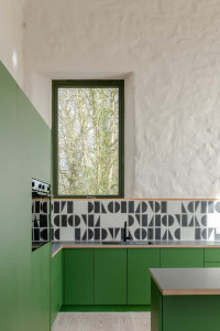 window over kitchen in restored Cornish schoolhouse
